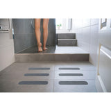 Tiras antiderrapantes grises p/áreas húmedas,50mm x 23cm,6pz Truper 101775